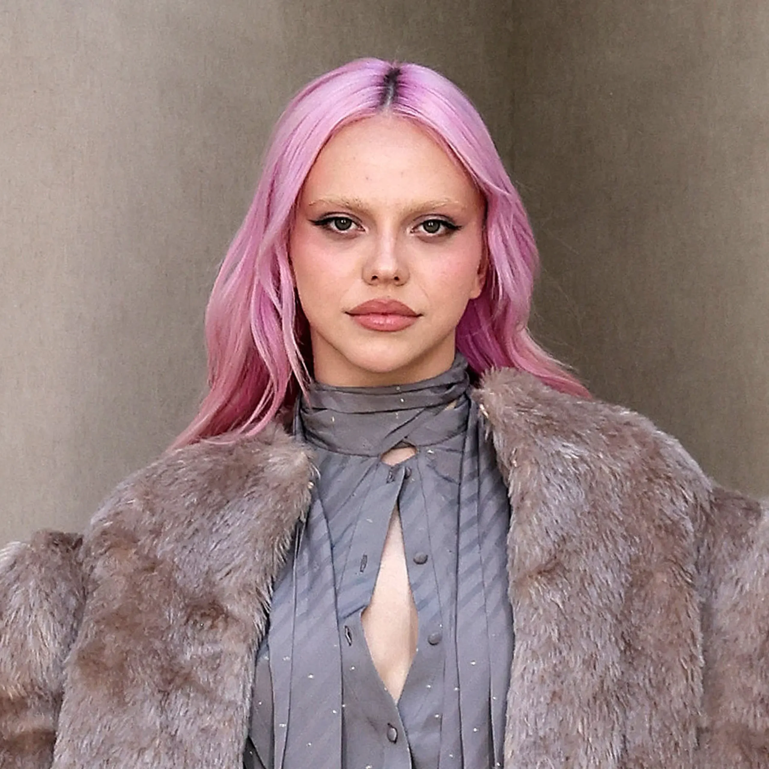 Slovak pop singer ADÉLA with pink hair performing on stage during The Red Bottoms Tour