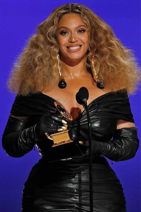Beyoncé performing on stage during her Cowboy Carter Tour in 2025