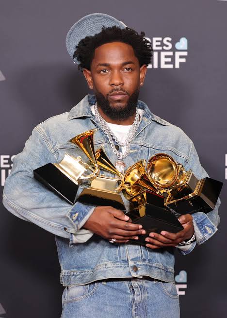 Kendrick Lamar performing on stage during the Grand National Tour in 2025