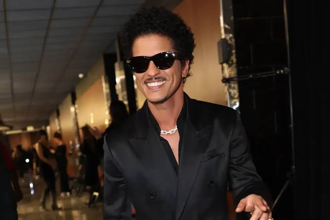 Bruno Mars performing on stage during The Romantic Tour in 2026