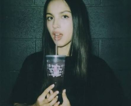 Olivia Rodrigo performing on stage during The Unraveled Tour in 2026