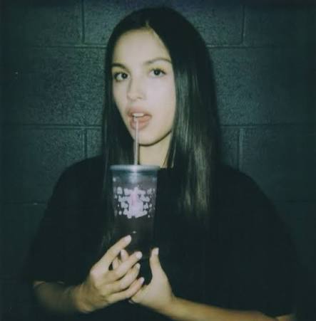 Olivia Rodrigo performing on stage during The Unraveled Tour in 2026