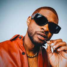 Usher performing on stage during his Past Present Future tour
